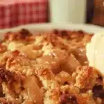 Delicious homemade apple dump cake served in a rustic dish with cinnamon