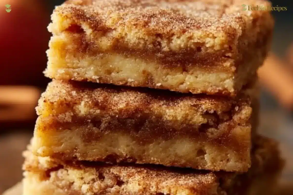 Delicious Apple Snickerdoodle Bars topped with cinnamon sugar.