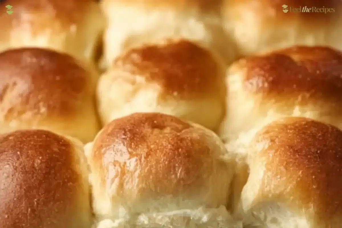Homemade fluffy rolls inspired by Texas Roadhouse recipe, golden and soft.