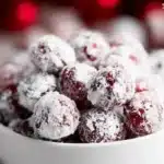 Deliciously sweet and tart candied cranberries on a serving plate.