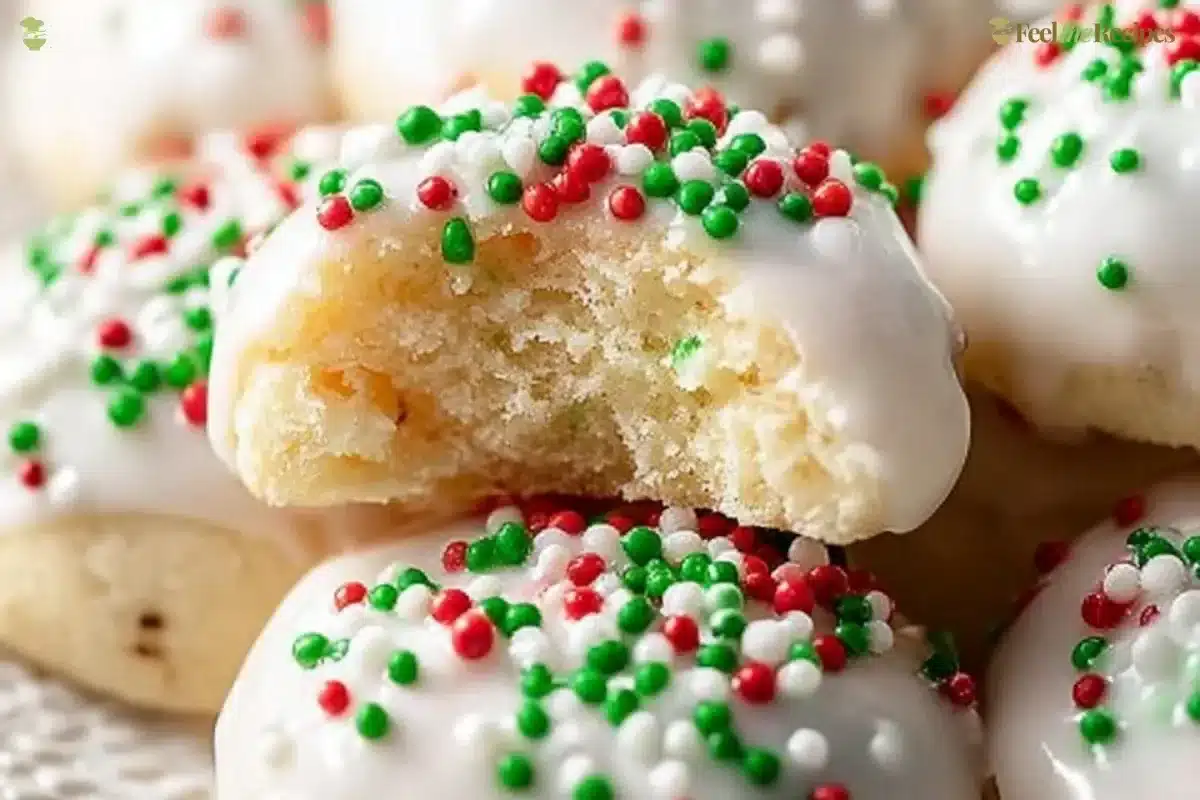 Plate of traditional Italian Christmas cookies decorated with festive icing.