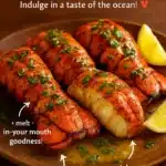 Baked lobster tails with lemon garlic butter served on a plate