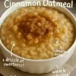 Bowl of brown sugar cinnamon oatmeal topped with fresh fruit.