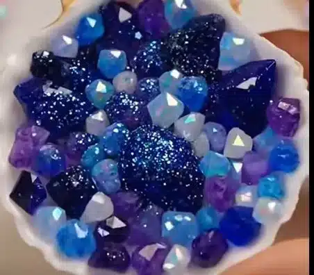 DIY crystal seashells transform ordinary shells into glittering treasures ✨ As crystals attach and expand, each shell becomes a sparkling surprise. Save this ocean-inspired science craft! #CrystalCra...