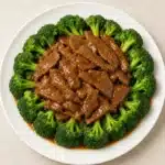 Delicious slow cooker beef and broccoli served with rice