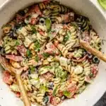 Silky pasta salad with creamy Italian dressing in a bowl