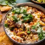 Delicious Mexican street corn dip made with roasted corn, spices, and creamy cheese