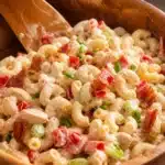 Delicious chicken pasta salad with fresh veggies and creamy dressing.