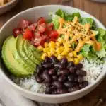 Easy no-cook black bean taco bowls ready to serve with fresh toppings.
