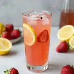 Refreshing strawberry lemonade with balsamic glaze served in a glass