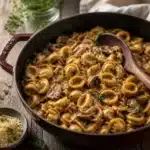 Creamy French Onion Pasta with caramelized onions and Gruyère cheese in a one-pot dish.